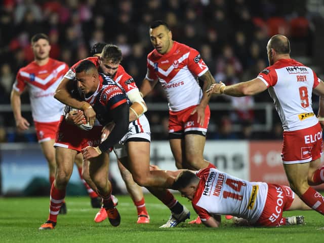 <p>Siosiua Taukeiaho of Sydney Roosters on the charge during the World Club Series Final between St Helens at Totally Wicked Stadium on February 22, 2020. Photo: Nathan Stirk/Getty Images</p>