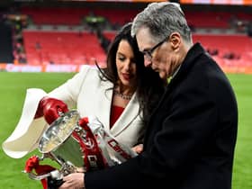 John W. Henry and Linda Pizzuti Henry, owners of Liverpool with the Carabao Cup trophy. Image: Andrew Powell/Liverpool FC via Getty Images