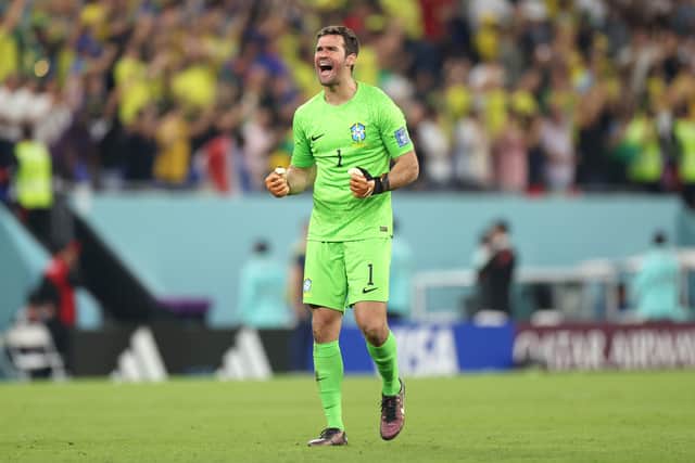 Alisson Becker celebrates while in action for Brazil. Picture: Catherine Ivill/Getty Images