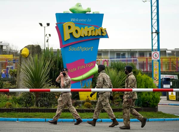 <p>Members of the military arrive at Pontins to set up a mass Covid-19 testing facility in 2020.</p>