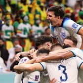 Harry Maguire of England celebrates with team mates after his captain Harry Kane of England scores their teams second goal during the FIFA World Cup Qatar 2022 Round of 16 match between England and Senegal at Al Bayt Stadium on December 04, 2022 in Al Khor, Qatar. (Photo by Clive Brunskill/Getty Images