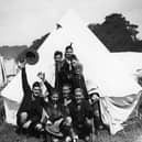 Canadian scouts waving from their tent during the Great Jamboree at Birkenhead, 1929. Image: Topical Press Agency/Getty Images