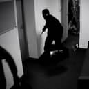 Masked thieves running off. Image: motortion - stock.adobe.com