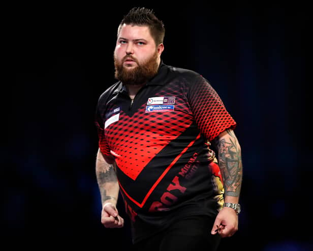 Michael Smith (pictured) and Stephen Bunting have qualified for the quarter finals of the £2.5m tournament. 