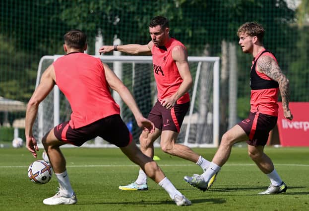 James Milner and Harvey Elliott of Liverpool during a training session on December 14, 2022 in Dubai, United Arab Emirates. (Photo by Nick Taylor/Liverpool FC/Liverpool FC via Getty Images)