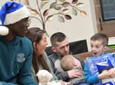 Amadou Onana of Everton make a Christmas 2022 visit to Claire House, West Derby. (Image: Everton TV)