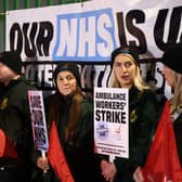 Ambulance workers take to the picket line outside headquarters in Coventry as strike action begins on December 21.