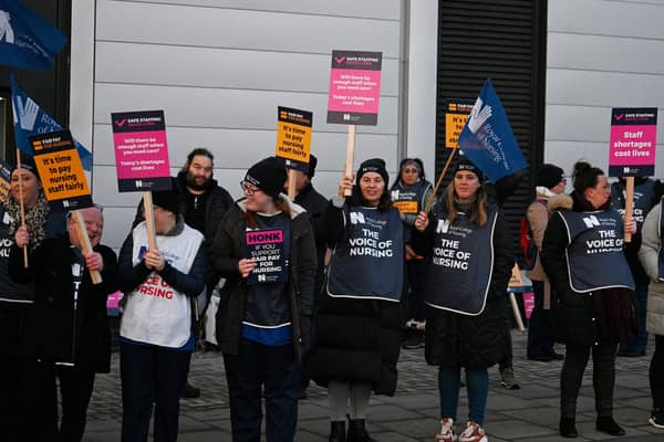 Nurses are seen on a picket line outside the Royal Liverpool University Hospital on December 20, 2022. Image: Annabel Lee-Ellis/Getty Images