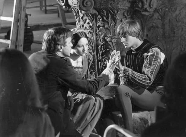 <p>Italian stage and film director, Franco Zeffirelli with Olivia Hussey and Leonard Whiting, during the filming of 'Romeo and Juliet'.  (Photo by Express/Express/Getty Images)</p>