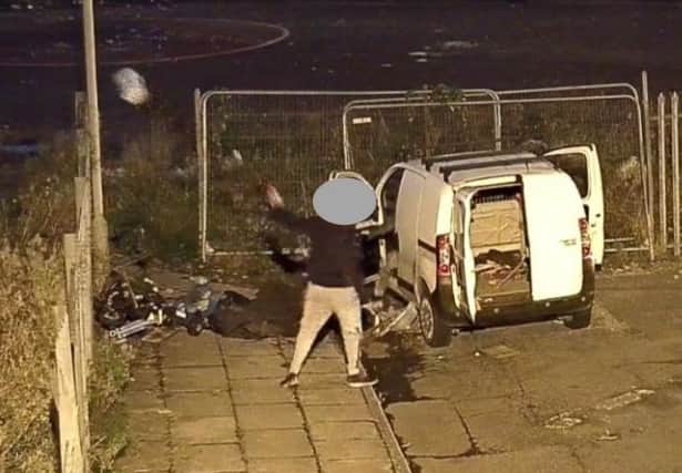 A flytipper caught on camera in Old Swan. Image: Liverpool City Council/twitter