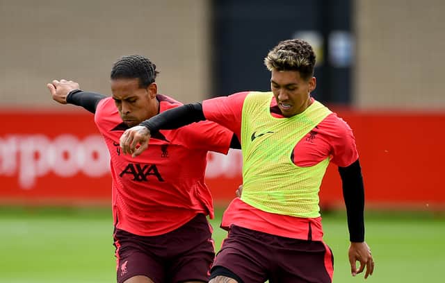 Virgil van Dij, left, and Roberto Firmino in Liverpool training. Picture: Andrew Powell/Liverpool FC via Getty Images