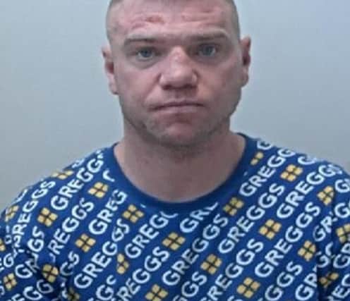 Convicted sex offender Shaun Aver was pictured in his mug shot wearing a Greggs-branded jumper. Image: GMP Bury North / SWNS