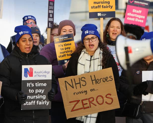 Nurses on strike at the picket line at Queen Elizabeth Hospital Birmingham on December 20, 2022