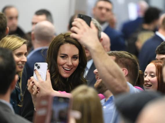 Kate Middleton poses for selfies with staff at Royal Liverpool University Hospital.