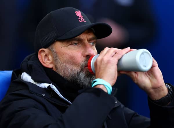 Jurgen Klopp, Manager of Liverpool, takes a drink prior to the Premier League match between Brighton & Hove Albion  (Photo by Bryn Lennon/Getty Images)