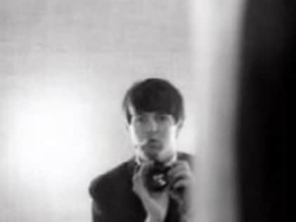 Paul takes portrait photos in a mirror in Paris, 1964. Image: National Portrait Gallery/Paul McCartney