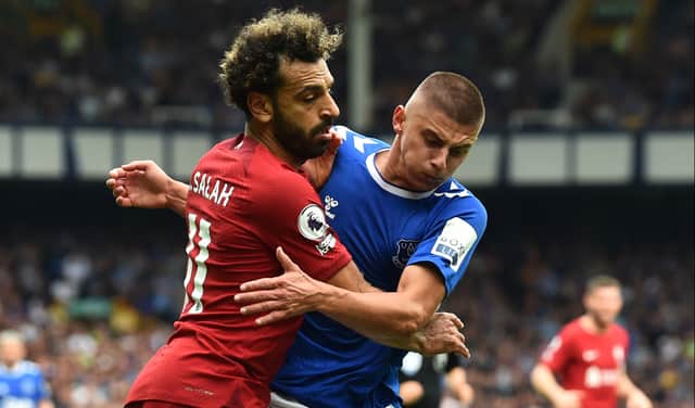 Liverpool forward Mo Salah battles Everton defender Vitalii Mykolenko. Picture: Andrew Powell/Liverpool FC via Getty Image