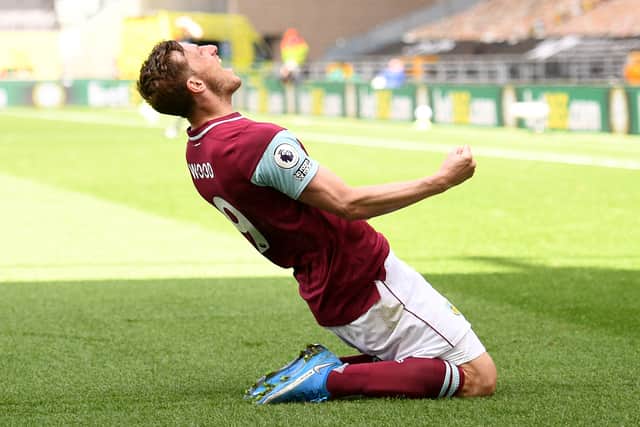 Chris Wood celebrates scoring for Burnley. Picture: OLI SCARFF/POOL/AFP via Getty Images