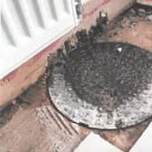 A manhole had been placed over a hole in the lounge of a property. Image: Liverpool City Council
