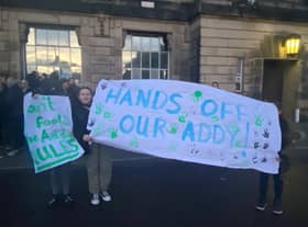 Protestors against “The Addy" a playground, being under threat before the meeting. Closing it has now been rejected by councillors. Credit: Ed Barnes