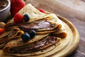 Delicious tasty pancakes with raspberries and blueberries. Image: beats_ - stock.adobe.com