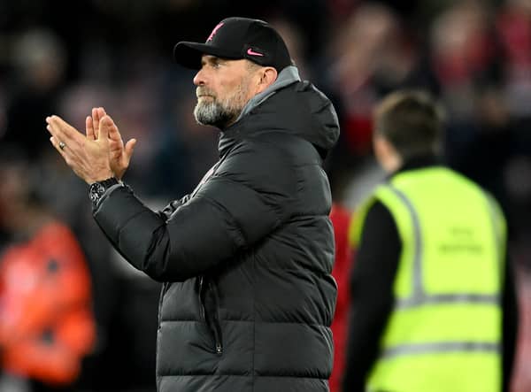 Jurgen Klopp manager of Liverpool showing his appreciation to the fans at the end of the UEFA Champions League round of 16 leg one match between Liverpool FC and Real Madrid at Anfield on February 21, 2023 in Liverpool, England. (Photo by Andrew Powell/Liverpool FC via Getty Images)