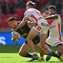 Castleford Tigers Niall Evalds in action with St Helens Jack Welsby. Image: Tony O'Brien/Getty Images