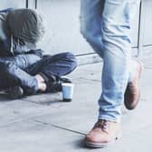 A homeless man on the street. Image: FollowTheFlow - stock.adobe.com