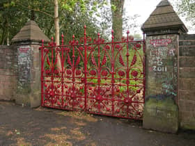  The iconic red gates at the entrance to Strawberry Field. Image: Jooniur/Wikimedia