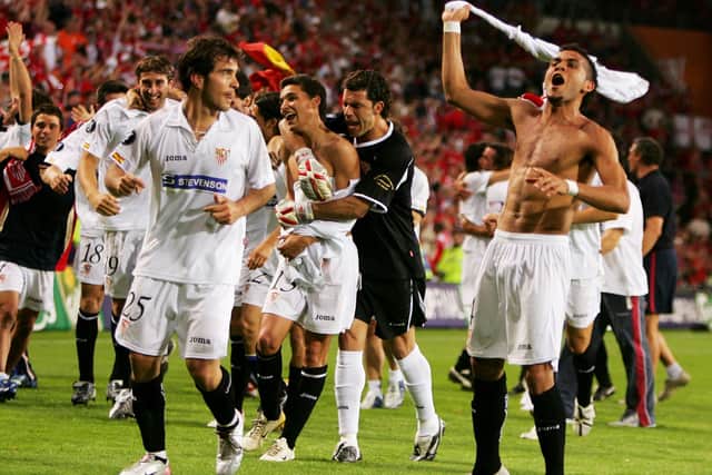 Daniel Alves of Sevilla FC celebrates after they won the UEFA Cup final against Middlesbrough FC on May 10, 2006.  Photo: Michael Steele/Getty Images