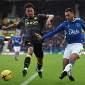 Dwight McNeil of Everton and Boubacar Kamara of Aston Villa in action during the Premier League match between Everton FC and Aston Villa at Goodison Park on February 25, 2023 in Liverpool, England. (Photo by Nathan Stirk/Getty Images)