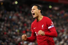 Virgil van Dijk of Liverpool celebrates after scoring the team's first goal during the Premier League match between Liverpool FC and Wolverhampton Wanderers at Anfield on March 01, 2023 in Liverpool, England. (Photo by Stu Forster/Getty Images)