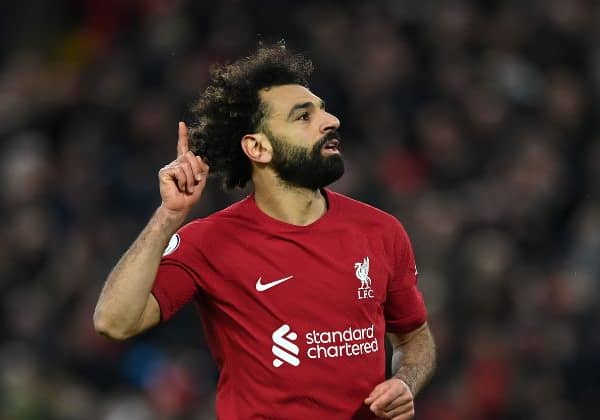 Mohamed Salah of Liverpool celebrates after scoring the team's fourth goal during the Premier League match between Liverpool FC and Manchester United at Anfield on March 05, 2023 