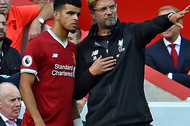 Liverpool manager Jurgen Klopp speaks to Dominic Solanke. Picture: Andrew Powell/Liverpool FC via Getty Images
