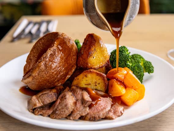 Gravy is poured on to a Sunday roast. Image: Josh - stock.adobe.com