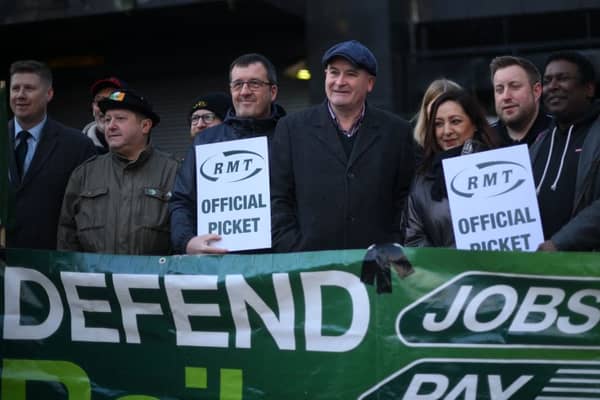 RMT general secretary Mick Lynch (centre) on an RMT picket line during January’s strike (Photo by DANIEL LEAL/AFP via Getty Images)