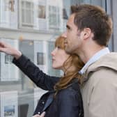 House buyers look in an estate agent’s window. Image: moodboard - stock.adobe.com