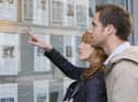House buyers look in an estate agent’s window. Image: moodboard - stock.adobe.com