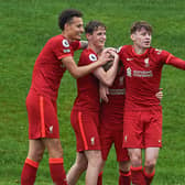 Liverpool youngster Conor Bradley, centre. Picture: Nick Taylor/Liverpool FC/Liverpool FC via Getty Images