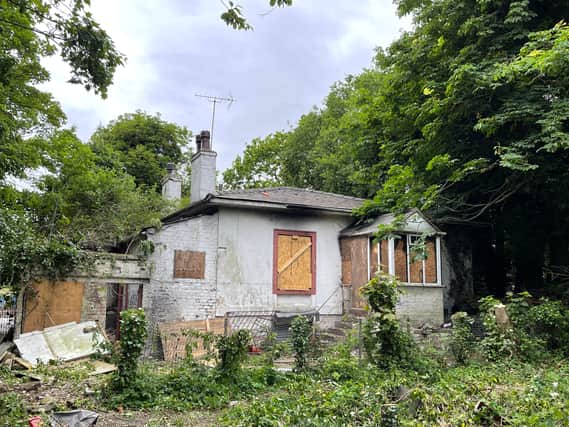 The abandoned cottage before renovation.