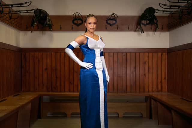 World champion boxer Natasha Jonas models the Aldaniti-inspired cocktail dress.