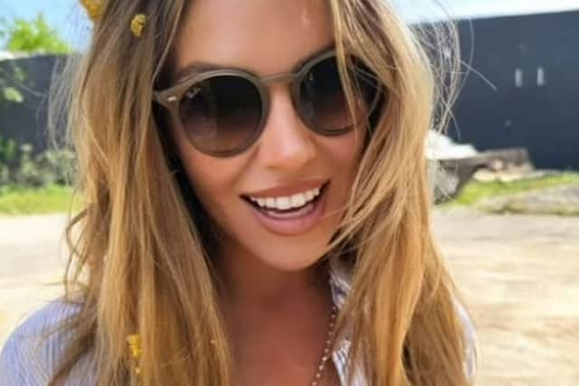Abbey shared a snap of herself in a bikini top and unbuttoned Oxford shirt. (Picture: Instagram/@abbeyclancy)