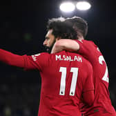 LEEDS, ENGLAND - APRIL 17: Mohamed Salah of Liverpool celebrates with teammate Andrew Robertson (obscured) after scoring the team’s second goal during the Premier League match between Leeds United and Liverpool FC at Elland Road on April 17, 2023 in Leeds, England. (Photo by Stu Forster/Getty Images)