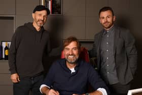Jurgen Klopp, centre, with outgoing Liverpool sporting director Julian Ward, right, and Fenway Sports Group president Mike Gordon. Picture: Andrew Powell/Liverpool FC via Getty Images