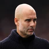 Manchester City manager Pep Guardiola looks on during a match
