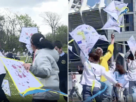 Kids fly kites in Liverpool and Ukraine at the same time.