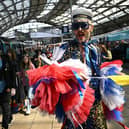 A Eurovision super-fan arrives at Lime Street Station in Liverpool, northern England on May 9, 2023, ahead of the first semi-final of the Eurovision Song contest. (Photo by Paul ELLIS / AFP) (Photo by PAUL ELLIS/AFP via Getty Images)