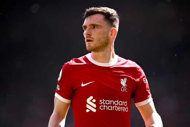 Liverpool’s Andy Robertson looks on during a match