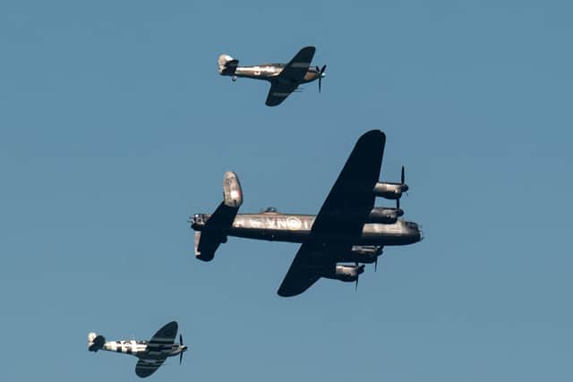 A Spitfire (L), hurricane (top) and a Lancaster bomber. Image: OLI SCARFF/AFP via Getty Images