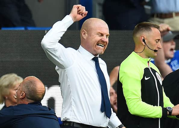  Sean Dyche (C) celebrates at the end of the English Premier League football match between Everton and Bournemouth at Goodison Park in Liverpool, northwest England, on May 28, 2023. (Photo by PETER POWELL / AFP) / RESTRICTED TO EDITORIAL USE. No use with unauthorized audio, video, data, fixture lists, club/league logos or 'live' services. Online in-match use limited to 120 images. An additional 40 images may be used in extra time. No video emulation. Social media in-match use limited to 120 images. An additional 40 images may be used in extra time. No use in betting publications, games or single club/league/player publications. /  (Photo by PETER POWELL/AFP via Getty Images)